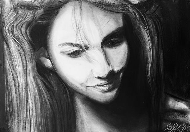 Charcoal portrait of actress Hannah Murray with soft shading and expressive gaze